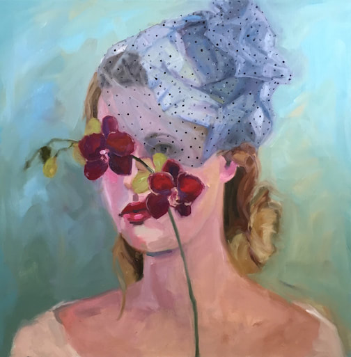 Portrait of a white girl in a fascinator hat holding red orchids in front of her face.