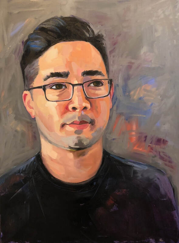 Portrait of an Asian man in glasses and a black t-shirt.