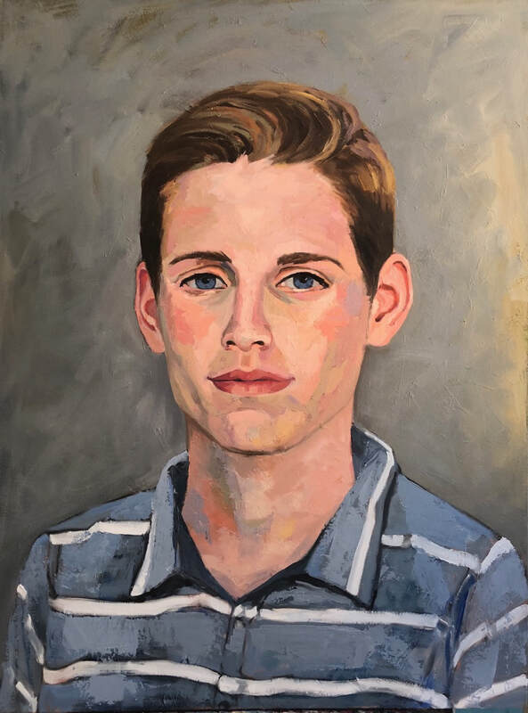 Portrait of teenager with blond hair and a grey and white striped shirt