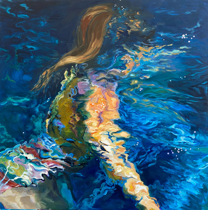 Abstract image of a swimmer beneath the water in a blue pool. Her brown hair floats on the surface.