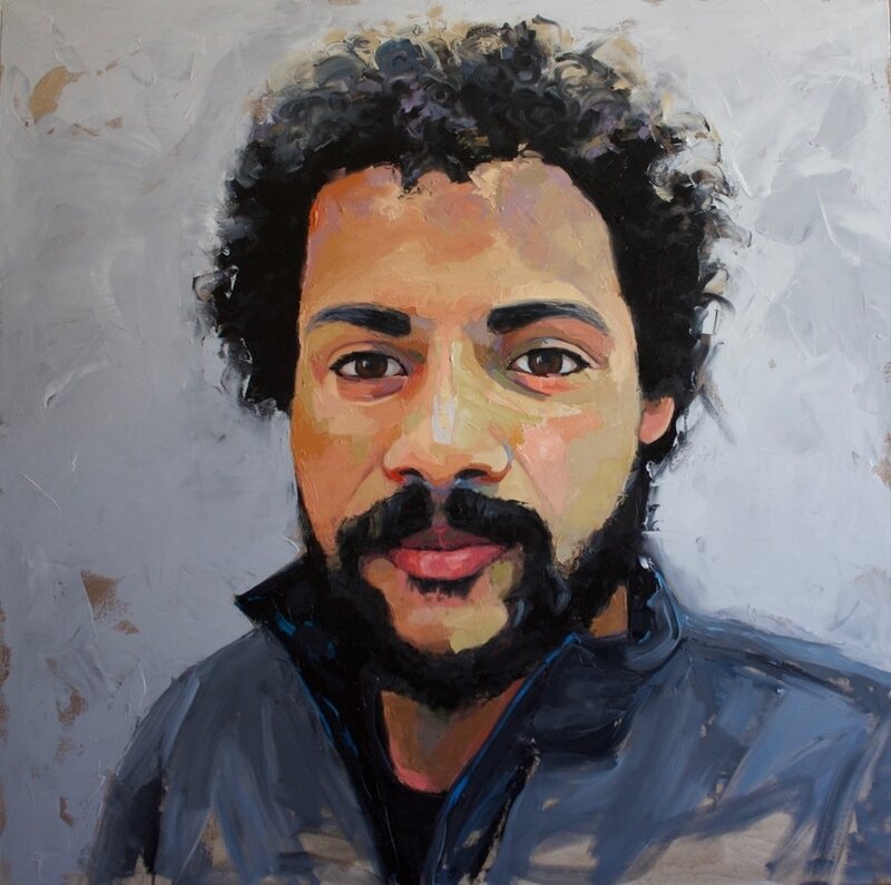 Portrait of a black man with an afro.