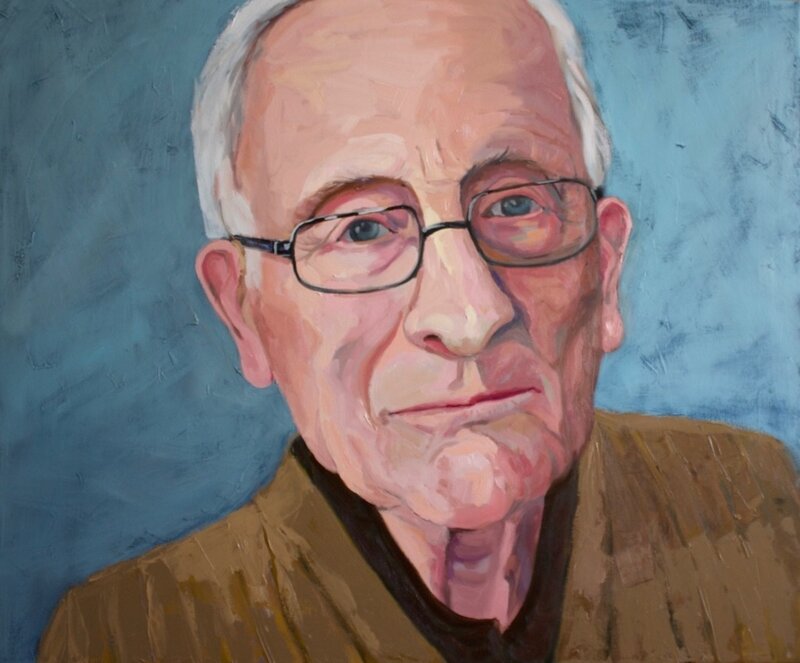 Portrait of an elderly white man with glasses.